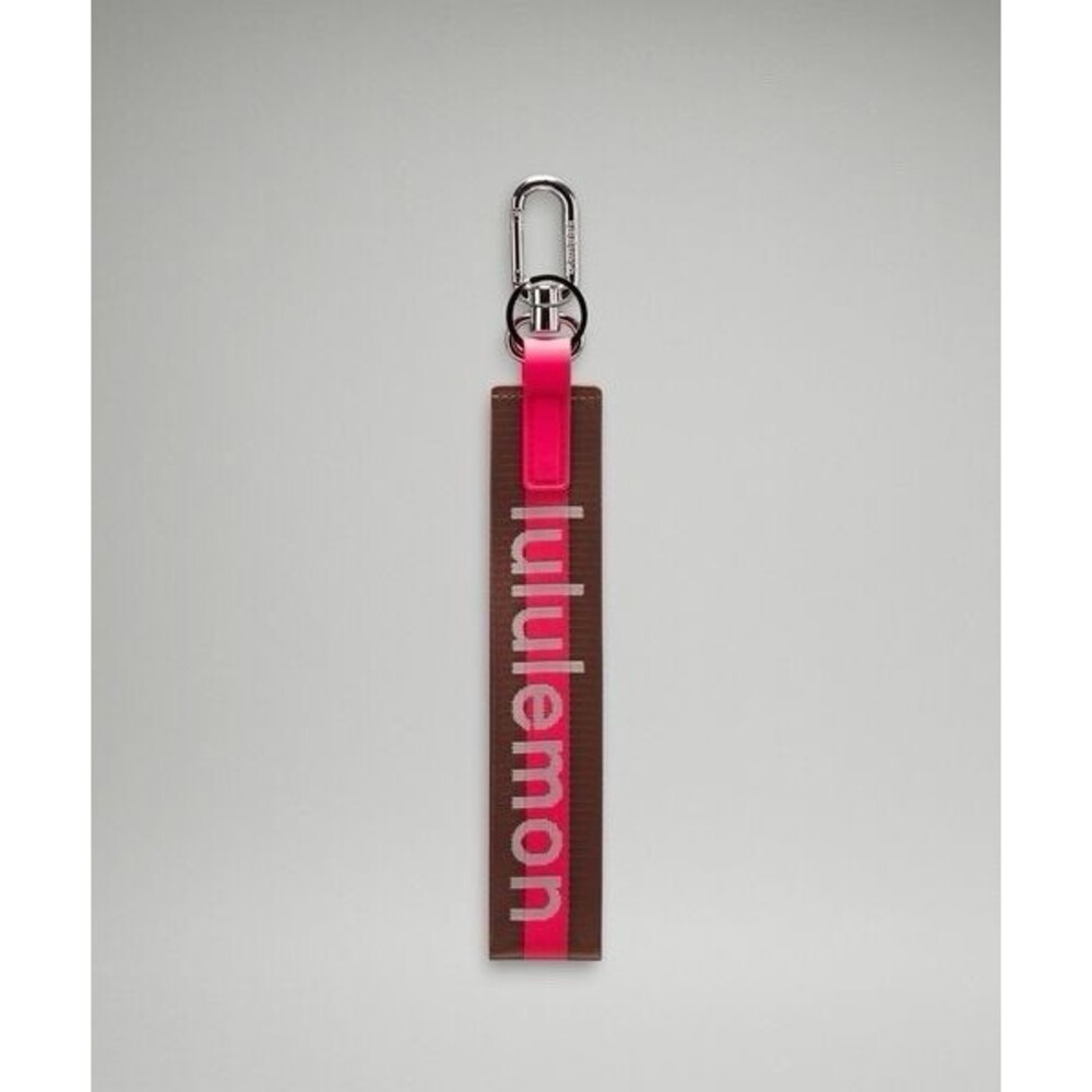 Lululemon Never Lost Keychain Wordmark Brown Pink One Size NWT